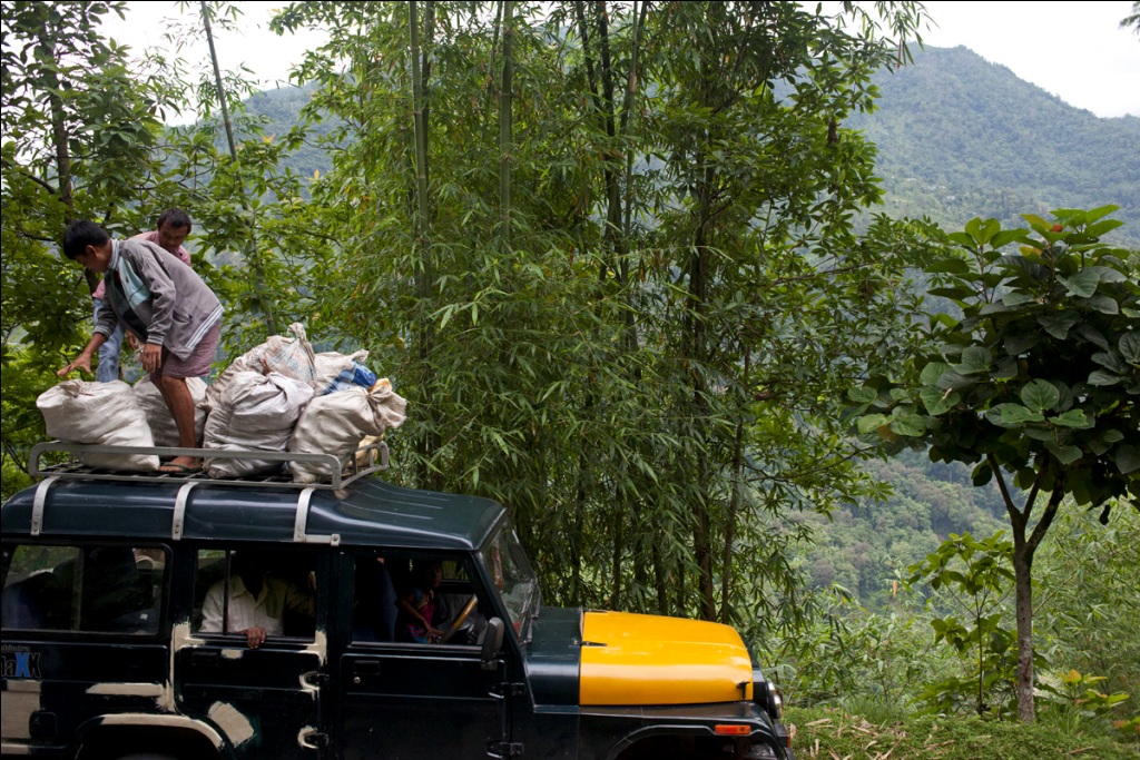 Jeep being loaded with farm produce near Sanni Village in West Pendam for the market in Singhtham, Sikkim.